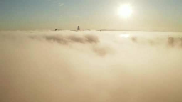 Flying Over the Clouds Towards the Sunrise alt