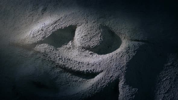 Torch Shines On Egyptian Eye Rock Carving alt