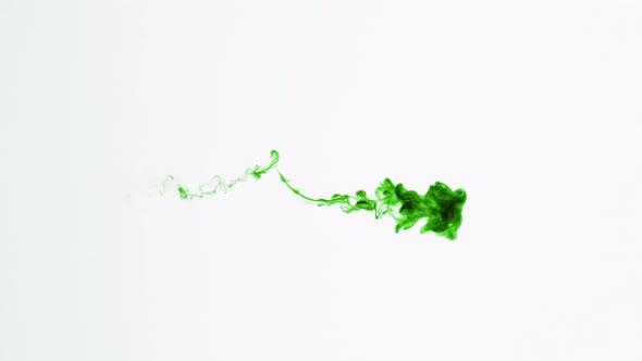 Isolated Green Ink Cloud in Macro Slow Motion on White Background Framed for Vertical Video