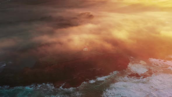 Drone Soaring Above Beautiful Ocean Waves at Magical Golden Orange Sunrise alt