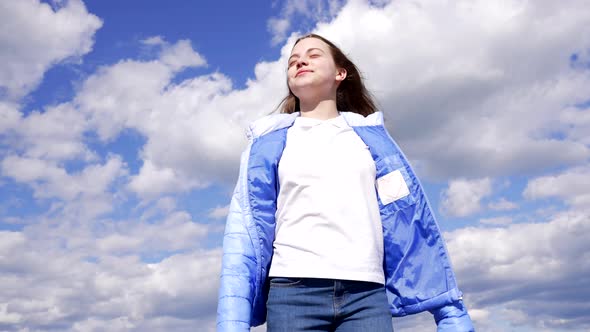 Happy Girl in Autumn Jacket Enjoy the Sun on Sky Background Achievement