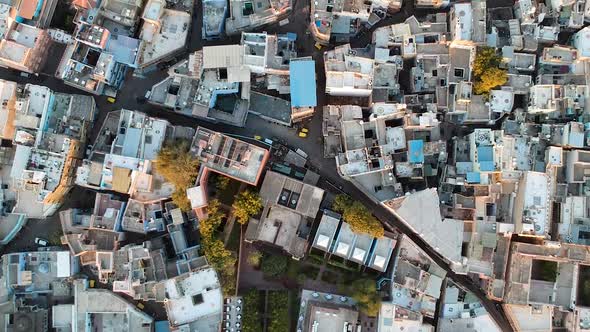 Sunrise fly over of densely populated, Blue city of Jodhpur, Rajasthan, India alt