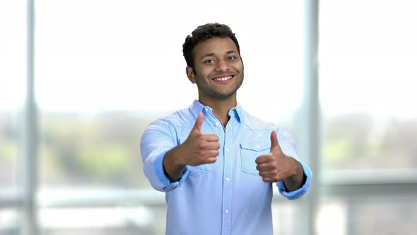 Young Happy Indian Man Showing Thumbs Up with Both Hands alt