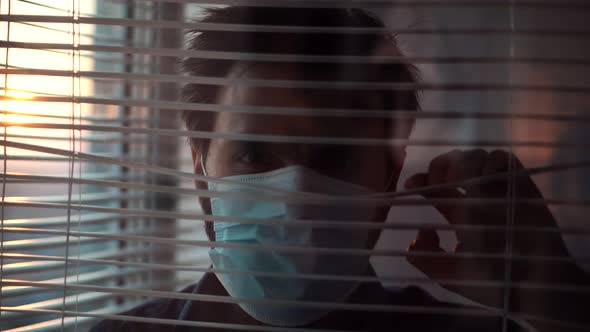 Man In Mask On Lockdown. Businessman On Self Isolation At Home.Lockdown Stay At Home. alt