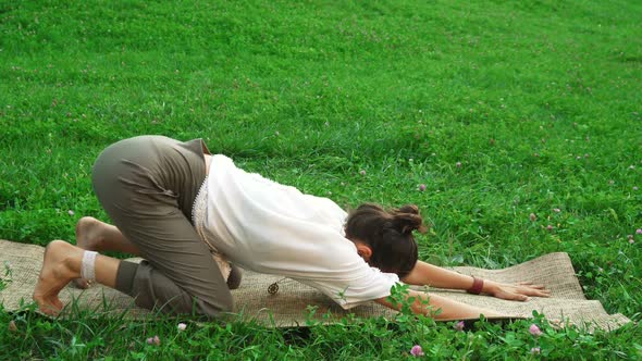Young Beautiful Girl Is Doing Yoga Poses alt