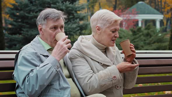 Carefree Elderly Grandparents Drinking Hot Coffee Tea Outdoors Senior Aged Couple Man Woman alt