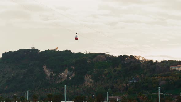Barcelona Port Vell Cable Car Cabins Leaving Torre Jaume I in Barcelona Spain alt