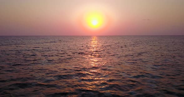 Beautiful birds eye abstract shot of a sunshine white sandy paradise beach and aqua blue water backg alt