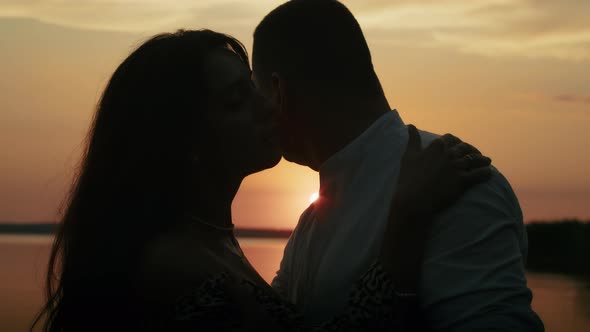 Happy Romantic Couple Enjoying Relaxing Sunset Walk on the Beach Travel Vacation Lifestyle alt