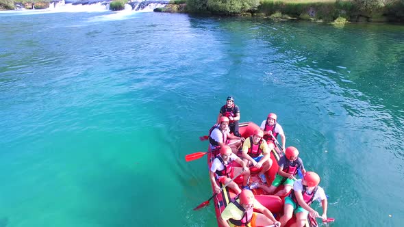 People rafting on waterfalls of Una river in Bosnia alt