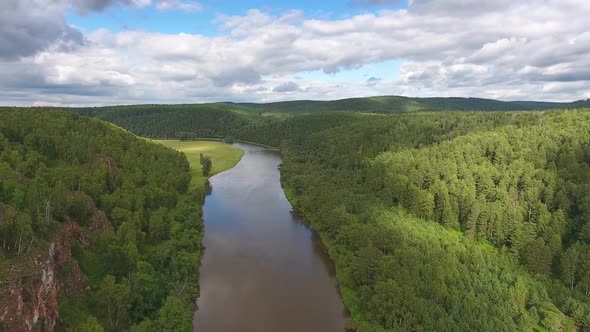 Aerial of Cave in Rock on Yuryuzan River in Russia alt