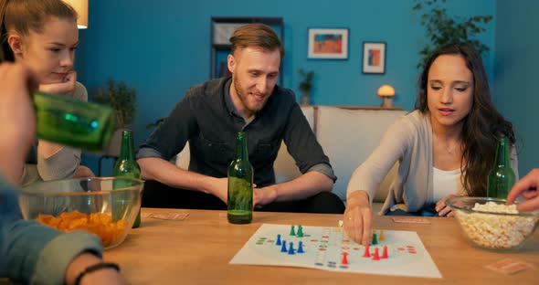 Beautiful Brunette Spends Evening in Living Room with Acquaintance They Play Board Games Girl Throws alt