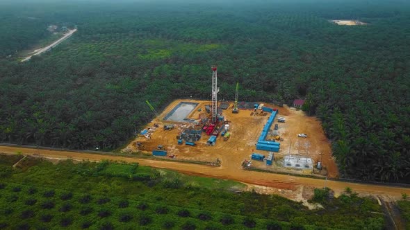Cinematic Drone Shot of Onshore Drilling and Workover Rig structure and Rig equipment for oil explor alt