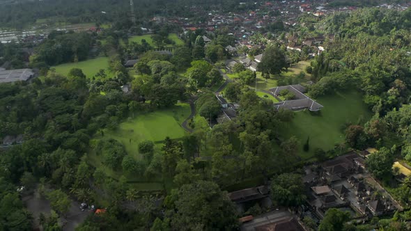 Aerial View of the Real Estate of Tampaksiring Presidential Palace Surrounded By Houses in the alt