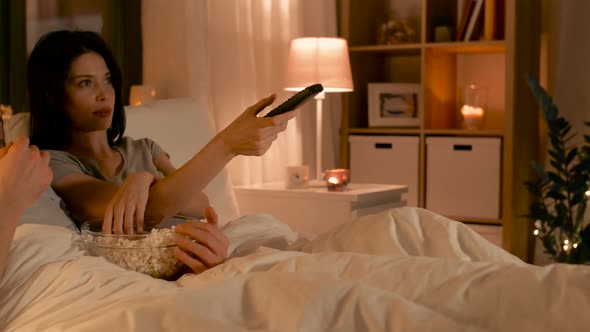 Couple with Popcorn Watching Tv at Home 26 alt