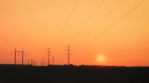 High Voltage Power Lines At The Sunset Time 6 alt