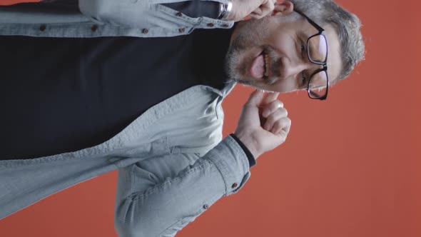 Happy Middle-aged Man Celebrating alt