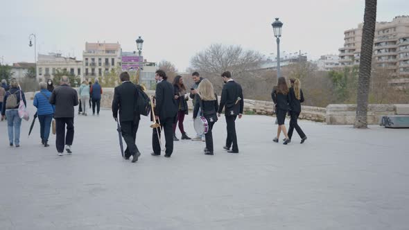 Street Musicians with Big Performing at the Walking Street in Downtown of a City alt