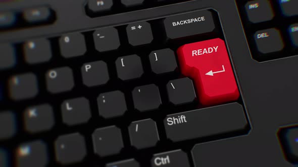 Ready button on keyboard. A finger presses Enter. Click ready. Realistic keyboard button. Red button alt