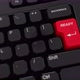 Ready button on keyboard. A finger presses Enter. Click ready. Realistic keyboard button. Red button