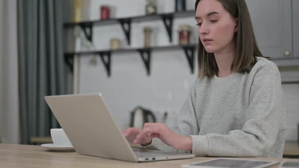 Hardworking Young Woman Closing Laptop and Going Away alt