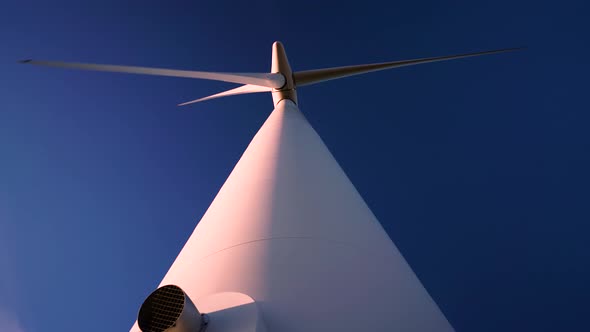 large wind turbine at sunrise