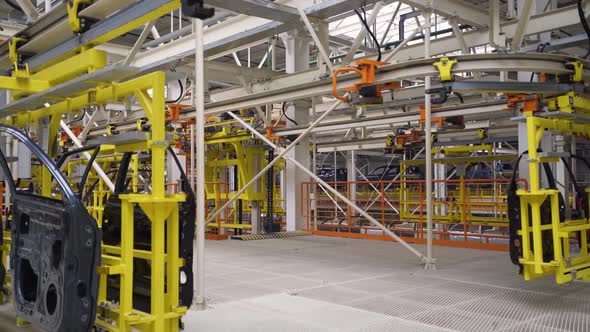 Automobile Plant, Modern Production of Cars, Transportation of Ready Car Doors on the Production alt