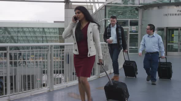 Business people walking at airport