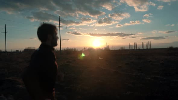 Man Run At Sunset. Man Running. Runner Male Jogging At Sunrise. Running Man Exercising On Trail. alt