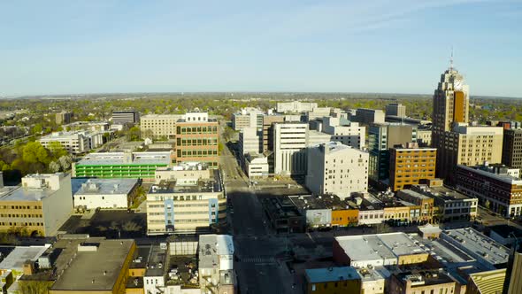 4k drone video of the state capital in Lansing, Michigan as the sun rises alt