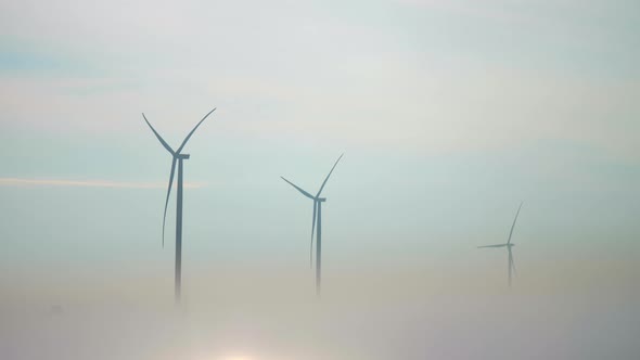 Wind Driven Generators at Offshore Station in Dense Fog alt