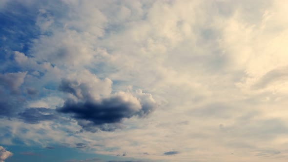 Timelapse, Sunset, White, Stunningly Beautiful, Airy Clouds Are Running Against the Blue Sky alt