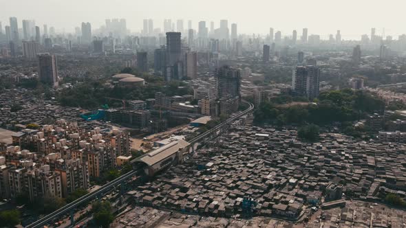 Aerial View Of Mumbai City, Maharashtra. High Rise Building And Slum Drone Shot, Living In India. alt
