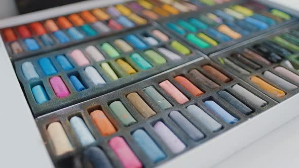 Closeup of a Set of Colored Pastel Paint Crayons alt