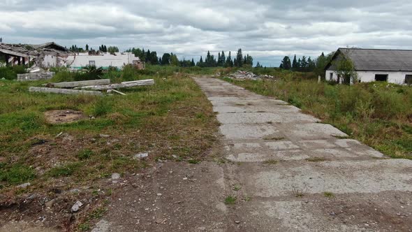 The Territory of a Former Abandoned Agricultural Farm in the Countryside alt