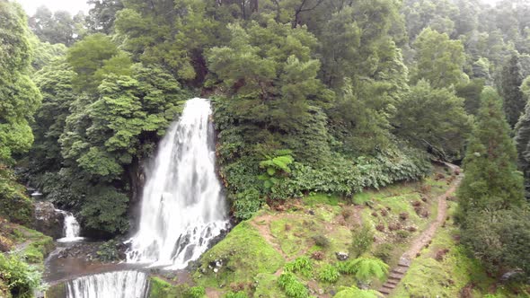 Beautiful waterfall and cascade surrounded by luxuriant vegetation , Azores, Portugal alt