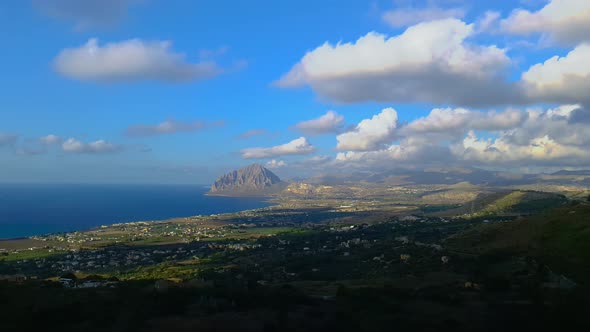 Spectacular aerial timelapse of Monte Cofano Sicilian natural reserve close to San Vito Lo Capo in I alt