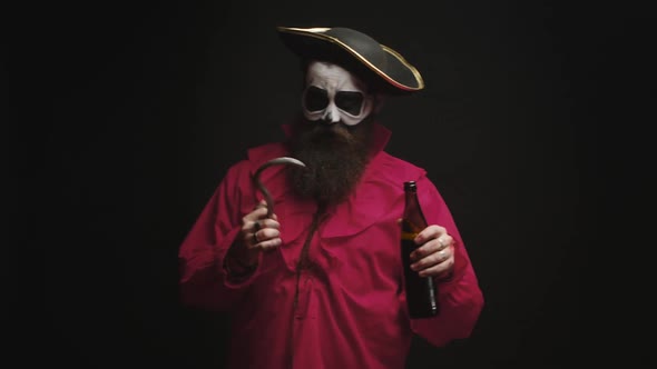 Drunk Bearded Man Dressed Up Like a Pirate with a Hook alt