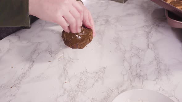 Step by step. Rolling out gingerbread cookie dough to bake Christmas cookies. alt
