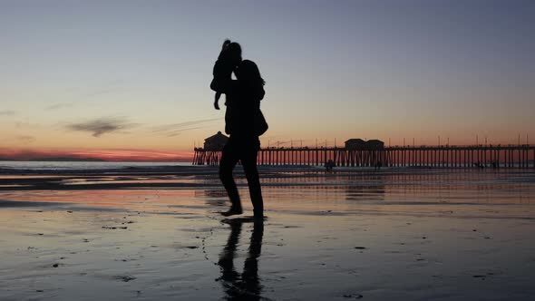 Father Enjoys the Beach with his Child