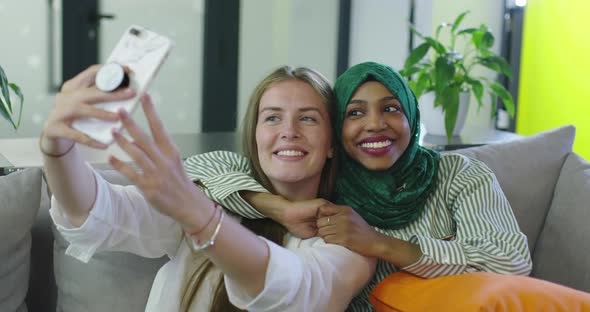 Friends From Different Countries Taking Selfie in Startup Office alt