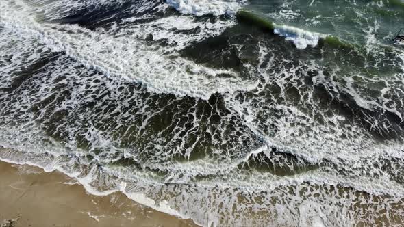 Aerial Drone View Flight Over Beautiful Sea Waves on Sand Beach with White Foam alt