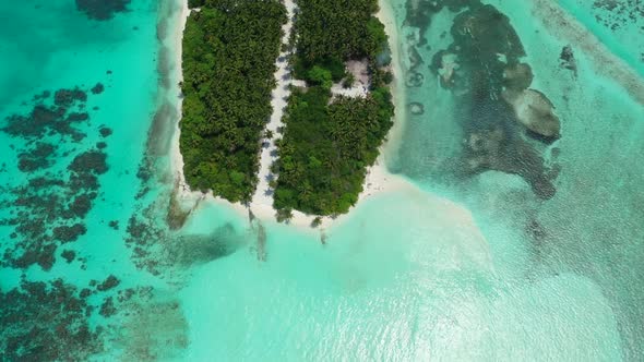 Aerial landscape of paradise resort beach break by blue water and white sand background of a daytrip alt