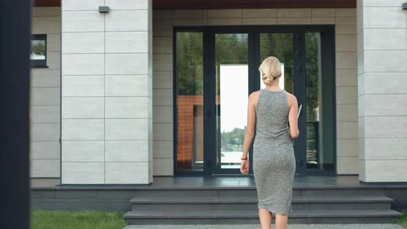 Business Woman Entering Luxury Office Door with Computer, Stock Footage