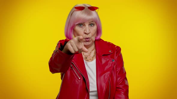Senior Old Woman Pointing to Camera with Playful Happy Expression Making Choice Showing Direction alt