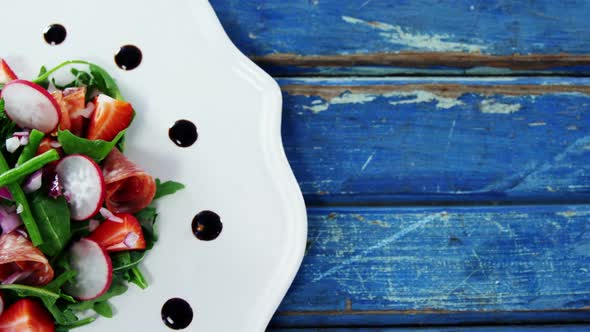 Salad served on plate alt