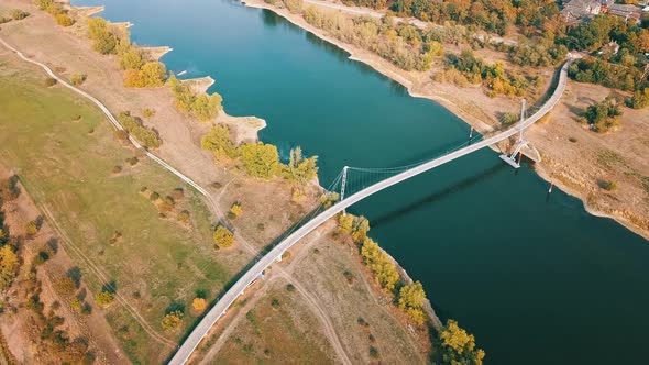 Aerial View Of Herrenkrug Bridge Spanning Elbe River In Magdeburg Germany Drone Pullback (Ascending alt
