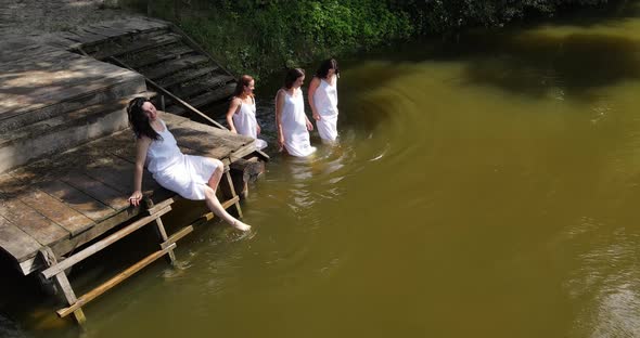 Girls In White Dresses Enter The River alt