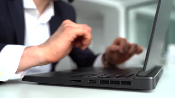 Hands on the Laptop Keyboard. Concept of Searching Information, Chating, Communication