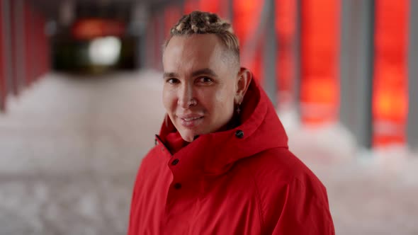 Happy Gay European Smiling in Front of the Camera on a Walk in Winter alt